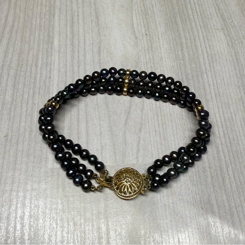 14k Yellow Gold Elegant Black Natural Multi-Strand Pearl Bracelet.